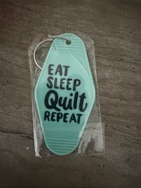 Mint Green 'Eat Sleep Quilt Repeat' Keychain - Unbranded